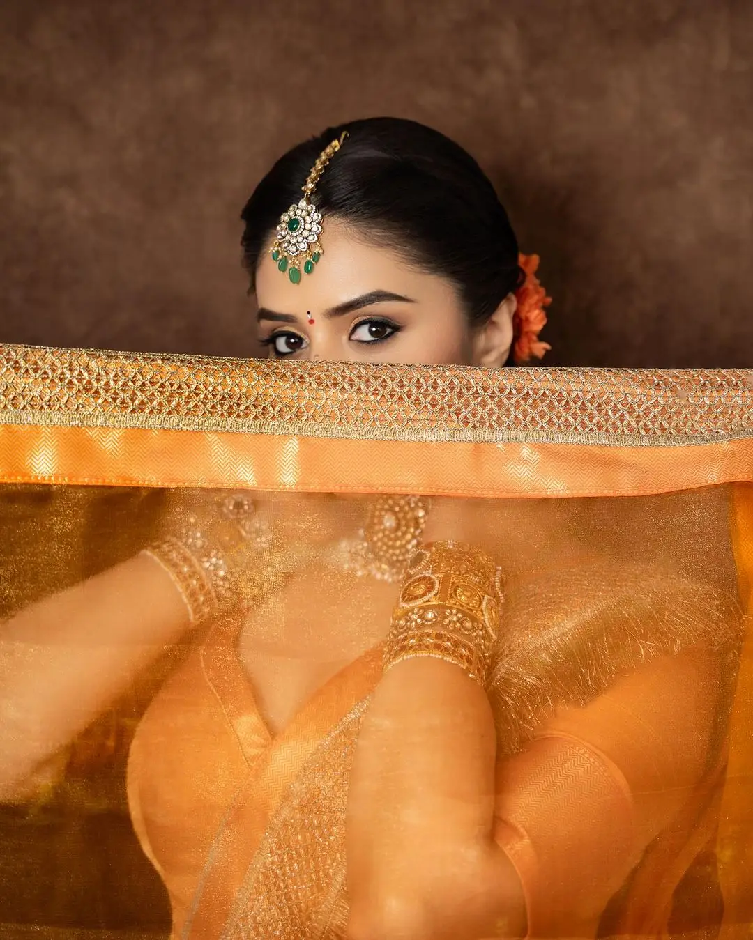 ETV Actress Sreemukhi in Orange Lehenga Blue Choli